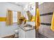 Bright bathroom with granite counters, walk-in shower, and yellow accents at 501 Main St, Lake Hamilton, FL 33851