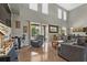 Spacious living room features large windows, comfortable seating, and access to the backyard at 524 Nogales, Kissimmee, FL 34758