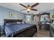 Bedroom with blue walls, a ceiling fan, and lots of natural light at 524 Nogales, Kissimmee, FL 34758