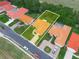 Aerial view of a single-story home shows a tile roof, mature landscaping, and a long driveway at 530 Greenway Dr, Lake Wales, FL 33898