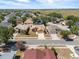 Aerial view displaying the home's location within a neighborhood with easy access to local amenities and roads at 533 Ronshelle Ave, Haines City, FL 33844