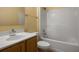 Clean bathroom with a shower-tub and a well-lit vanity with ample counter space at 533 Ronshelle Ave, Haines City, FL 33844