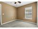 This cozy bedroom offers a peaceful retreat with a window bringing in natural light at 533 Ronshelle Ave, Haines City, FL 33844