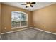 Cozy bedroom with natural light, offering a comfortable and inviting space at 533 Ronshelle Ave, Haines City, FL 33844