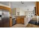 Well-equipped kitchen featuring granite countertops, stainless steel appliances, and tiled floors at 533 Ronshelle Ave, Haines City, FL 33844