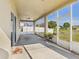 The large screened patio overlooks the backyard at 5787 Dornich Dr, Auburndale, FL 33823