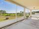 The enclosed patio provides an outdoor living space with relaxing views at 5787 Dornich Dr, Auburndale, FL 33823