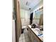 Bathroom featuring a white vanity and toilet at 620 Se Oleander Se Dr, Winter Haven, FL 33880