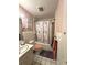 Cozy bathroom featuring a tub with shower, toilet, and vanity at 620 Se Oleander Se Dr, Winter Haven, FL 33880