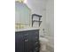 Bathroom featuring shower, shelves, vanity and tile at 625 Disa Dr, Davenport, FL 33837