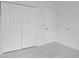 Bedroom featuring closet and light, neutral colored walls and flooring at 625 Disa Dr, Davenport, FL 33837