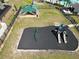 Aerial view of the community playground with swings, slides and a picnic shelter at 625 Disa Dr, Davenport, FL 33837