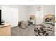 Bedroom with carpet, twin beds, and mirrored closets at 662 Orista Dr, Davenport, FL 33897