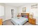 Bedroom featuring a queen-sized bed with carpet flooring at 662 Orista Dr, Davenport, FL 33897