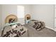Bedroom with carpet, twin beds, and a bright window at 662 Orista Dr, Davenport, FL 33897