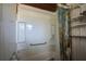 Bathroom featuring a shower/tub combination with a colorful waterfall themed shower curtain at 6925 3Rd St, Mulberry, FL 33860