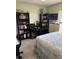 Well-lit bedroom with bookshelves, dresser and a relaxing atmosphere at 716 Maderia Ct, Kissimmee, FL 34758