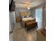 Traditional bedroom with a wooden bed frame, dresser, and natural light at 716 Maderia Ct, Kissimmee, FL 34758