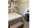 Bedroom featuring a comfortable bed, desk, and closet space at 716 Maderia Ct, Kissimmee, FL 34758