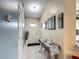 Bright entryway features tile flooring, decorative accents, and a view of the front door at 716 Maderia Ct, Kissimmee, FL 34758