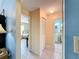 Hallway view leads to bedroom and bathroom at 716 Maderia Ct, Kissimmee, FL 34758
