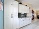 Bright and spacious kitchen with modern appliances, and white cabinetry at 716 Maderia Ct, Kissimmee, FL 34758