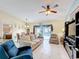 Open living area offers ample seating and pool view at 716 Maderia Ct, Kissimmee, FL 34758