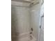 Shower and bathtub combination with tile surround and showerhead at 716 Maderia Ct, Kissimmee, FL 34758