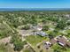 Scenic aerial view of the property with lush greenery and neighboring houses at 9019 Oakwood Dr, Lake Wales, FL 33898