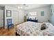 Light bedroom with a large closet and tile flooring at 9019 Oakwood Dr, Lake Wales, FL 33898