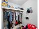 Walk-in closet with shelving, hanging rods, and storage space at 9019 Oakwood Dr, Lake Wales, FL 33898