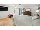Bedroom featuring tile floors, neutral tones, and access to a private patio at 9019 Oakwood Dr, Lake Wales, FL 33898