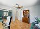 Home office space with tile floors and a decorative hutch at 9019 Oakwood Dr, Lake Wales, FL 33898