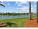 Picturesque lake view from this home's backyard at 936 Lake Berkley Dr, Kissimmee, FL 34746