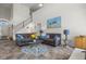 Bright and airy living room with high ceilings, comfortable seating, and neutral decor at 936 Lake Berkley Dr, Kissimmee, FL 34746