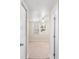 View into the bedroom with neutral carpet, ceiling fan and window with blinds at 102 Deen Blvd, Auburndale, FL 33823
