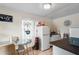Efficient kitchen with dining table, modern appliances, and bright natural light at 102 Deen Blvd, Auburndale, FL 33823