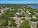 Aerial view showcasing the property boundaries, surrounding greenery, and neighborhood at 1024 Campbell Ave, Lake Wales, FL 33853