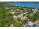 Overhead shot of property with outline and trees near a road and a lake at 1024 Campbell Ave, Lake Wales, FL 33853