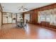 Dining room features wood paneling, decorative tile floors and built-in shelving at 1024 Campbell Ave, Lake Wales, FL 33853