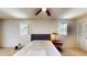 Bedroom featuring neutral carpet, a ceiling fan, and a window with shutters at 108 Lake Howard Dr Nw, Winter Haven, FL 33880