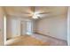 Carpeted bedroom featuring double closet and neutral walls at 108 Lake Howard Dr Nw, Winter Haven, FL 33880