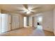 Carpeted bedroom featuring double closet, neutral walls and base trim at 108 Lake Howard Dr Nw, Winter Haven, FL 33880