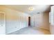 Bedroom featuring closet and window with neutral walls and base trim at 108 Lake Howard Dr Nw, Winter Haven, FL 33880