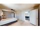 Bedroom featuring a ceiling fan and an ensuite bathroom at 108 Lake Howard Dr Nw, Winter Haven, FL 33880