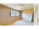 Bedroom featuring secure window and neutral walls and base trim at 108 Lake Howard Dr Nw, Winter Haven, FL 33880