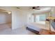 Bright bedroom featuring a ceiling fan at 108 Lake Howard Dr Nw, Winter Haven, FL 33880