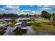 A waterfront property with a dock and pool at 108 Lake Howard Dr Nw, Winter Haven, FL 33880