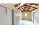 Inside the shed reveals a bright open room with a window, ceiling fan and two white doors at 108 Lake Howard Dr Nw, Winter Haven, FL 33880