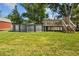 Backyard view of an above ground pool and deck at 1221 Alameda S Dr, Lakeland, FL 33805